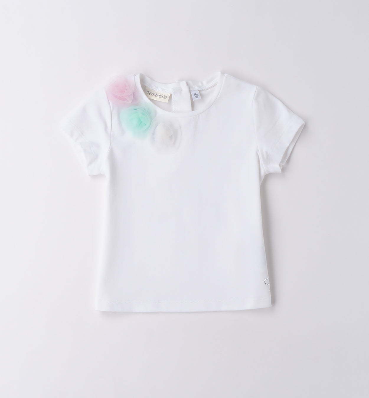 T-shirt bianca bambina con applicazioni pastello

