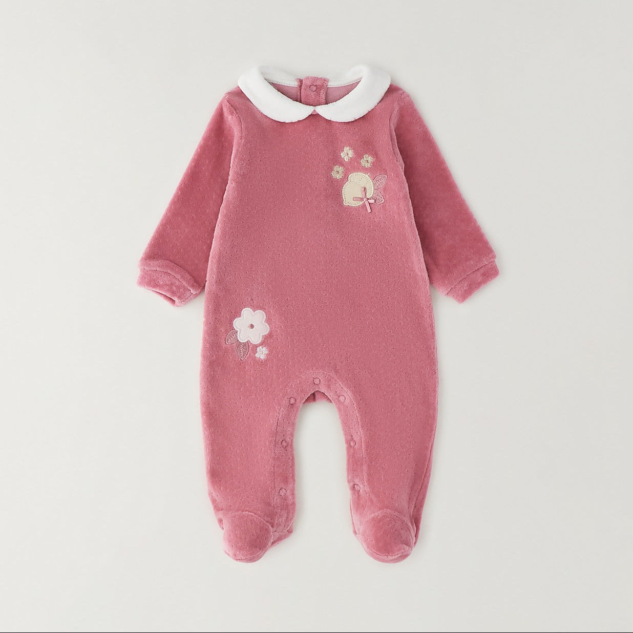Tutina ciniglia neonata rosa con piedini e ricami, ideale per prima nascita e uscita clinica