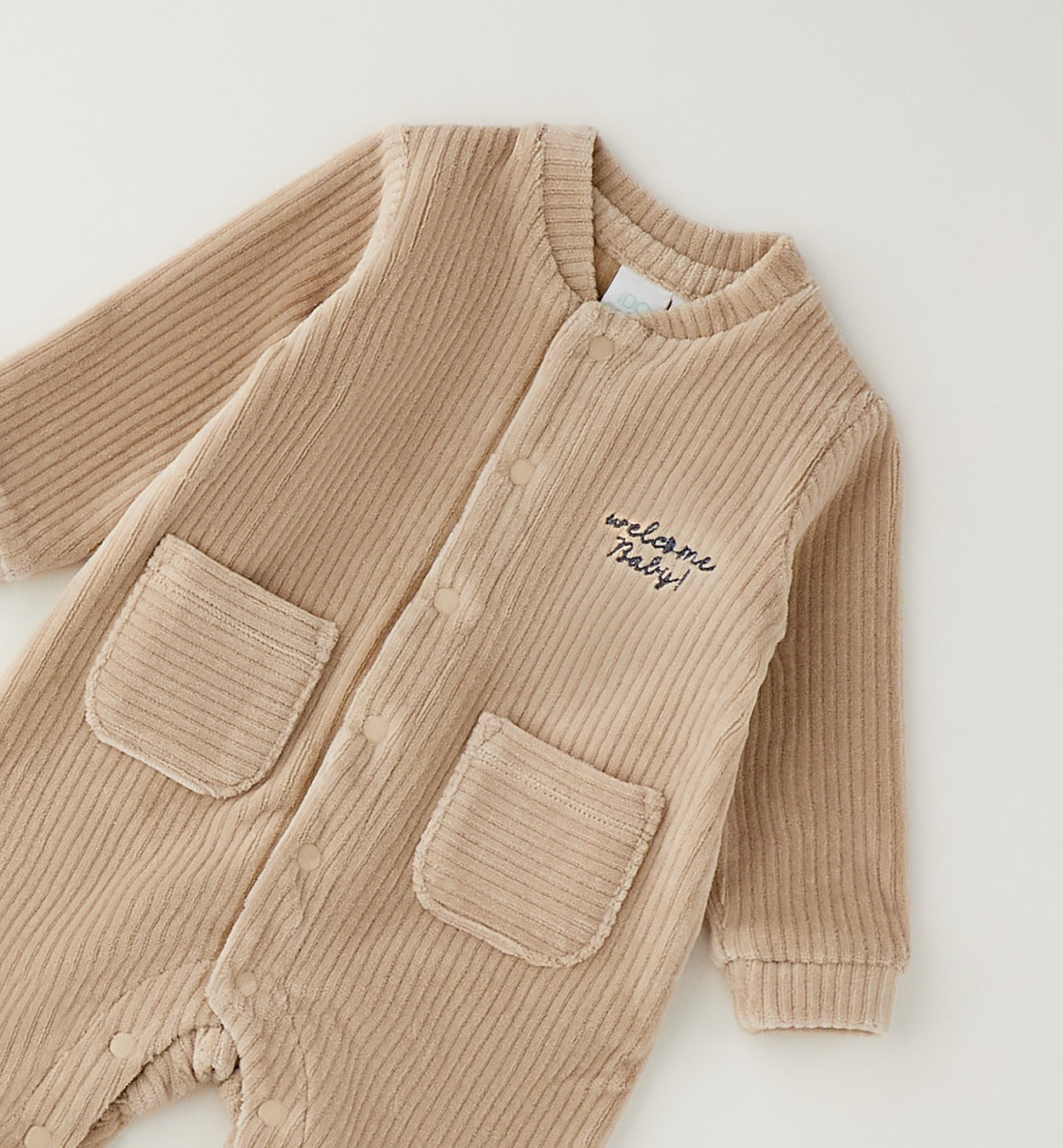 tutina-neonato-beige-ciniglia-con-piedini.jpg