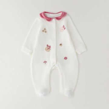 Tutina nascita neonata in ciniglia bianca con colletto rosa, ricami floreali e piedini integrati