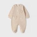 Retro tutina neonata beige in ciniglia con piedini e apertura con bottoncini