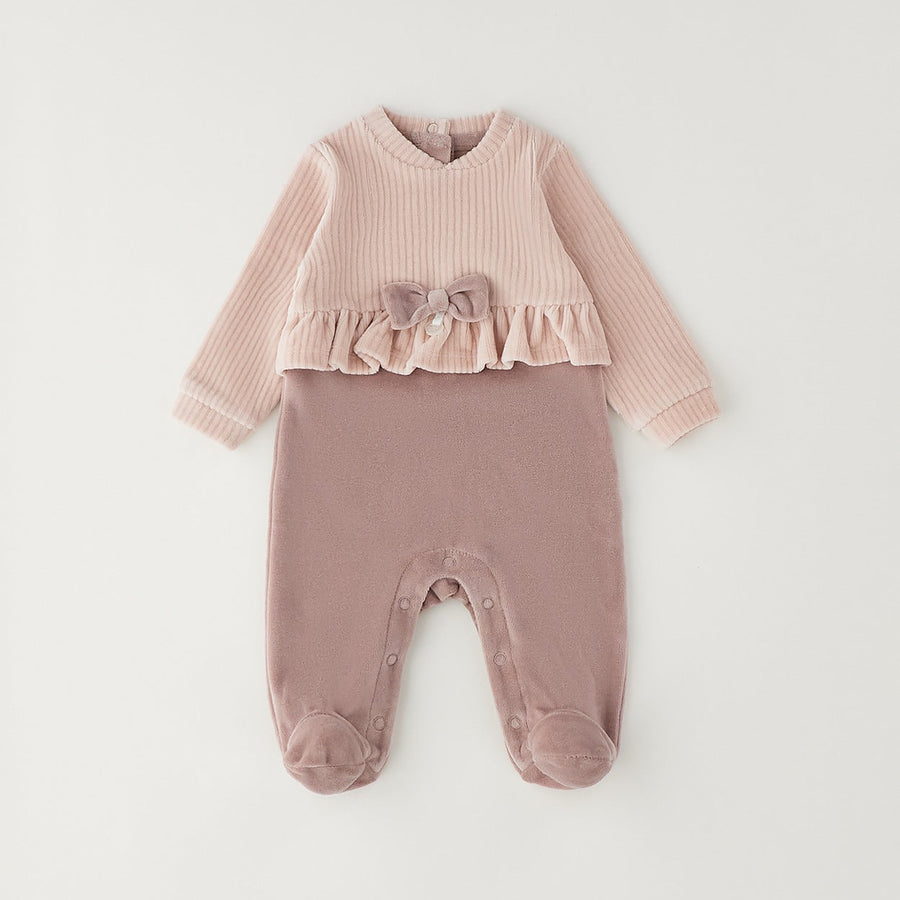 Tutina neonata in ciniglia rosa con fiocco e volant