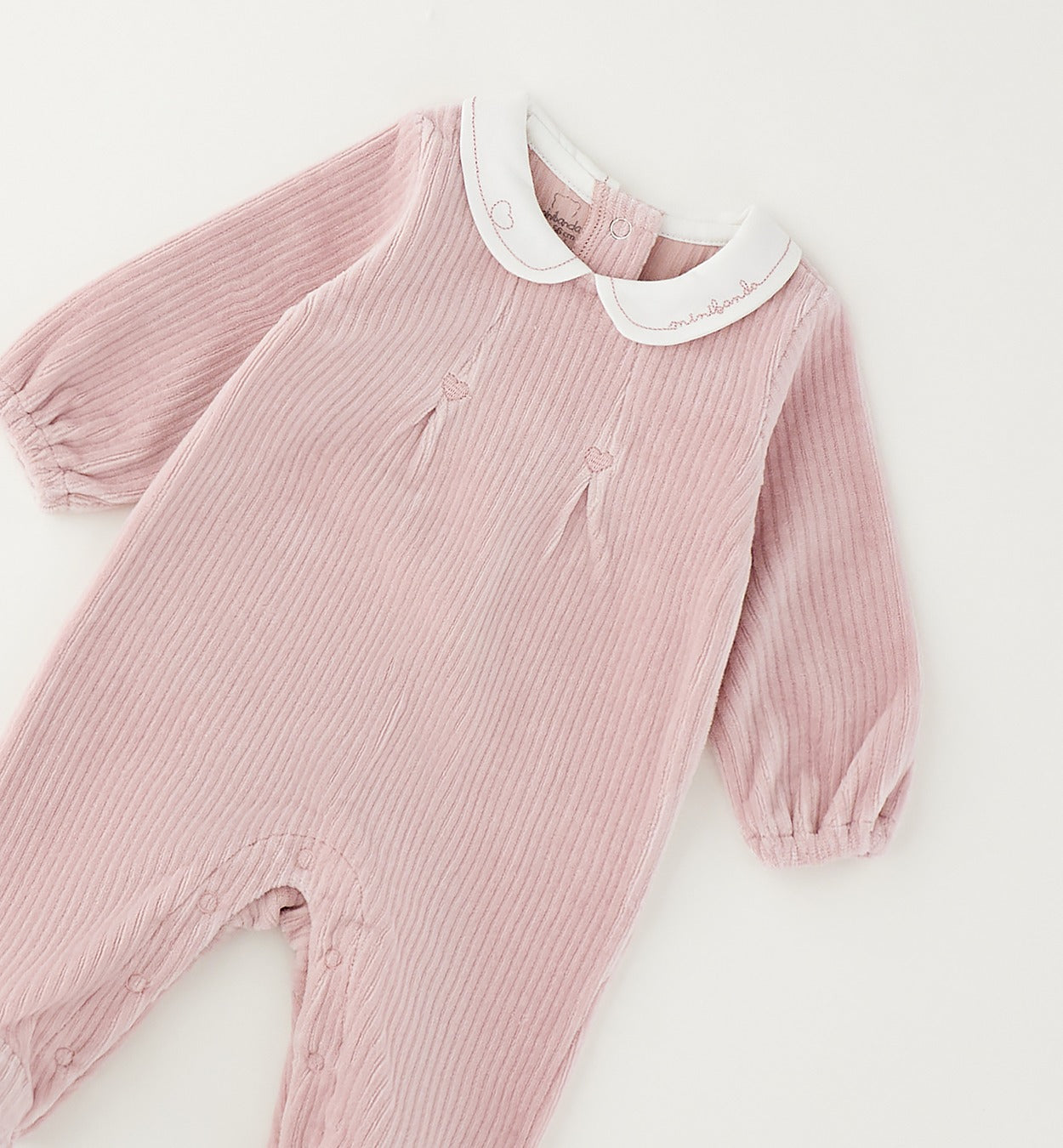 Tutina nascita neonata in ciniglia rosa a coste con colletto bianco ricamato, cuoricini e piedini
