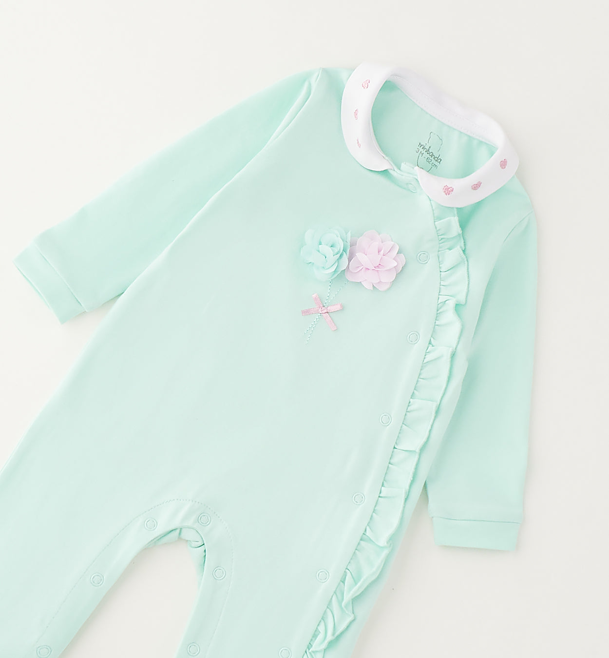 tutina neonata elegante cotone con balza laterale e decorazioni floreali