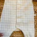 Tutina neonato in caldo cotone beige a quadri con colletto classico Made in Italy.