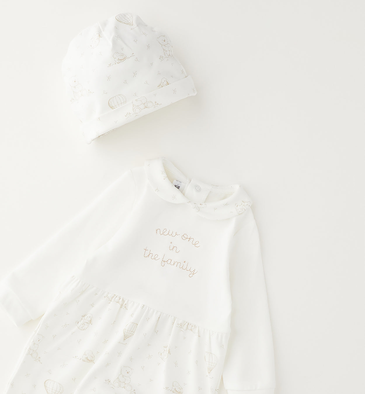 tutina neonato con scritta decorativa frontale