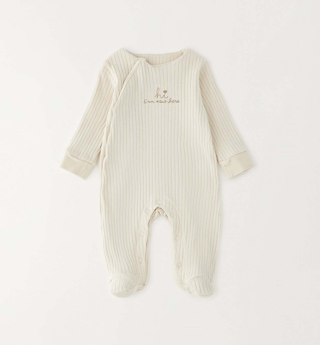 Tutina neonato in cotone panna a costine