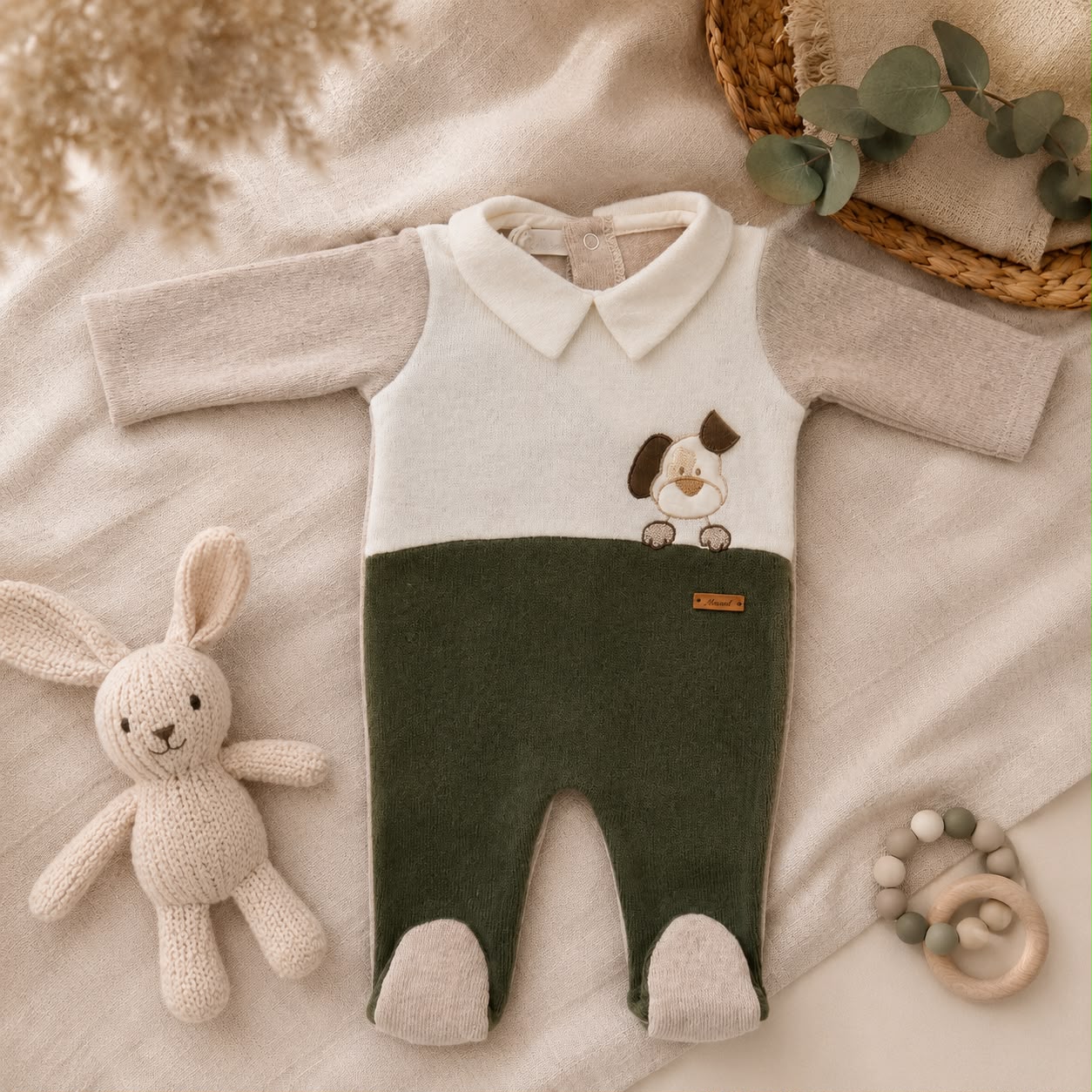 Dettaglio etichetta della tutina neonato Made in Italy.