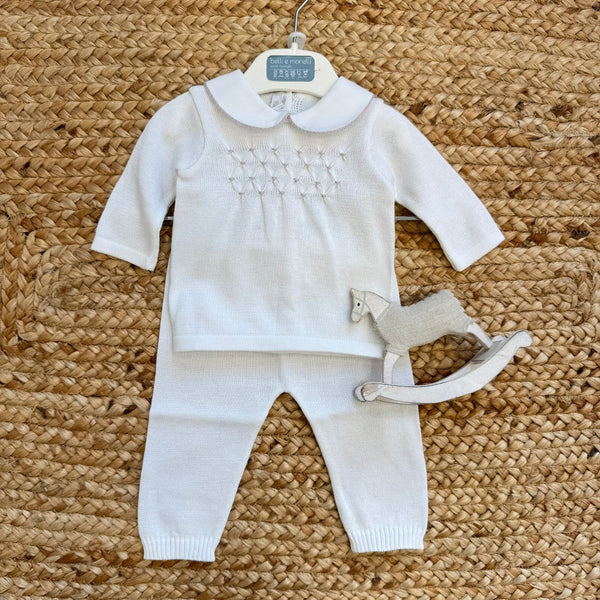 Tutina neonato unisex in 100% filo di cotone colore panna, composta da maglia con colletto e pantalone coordinato