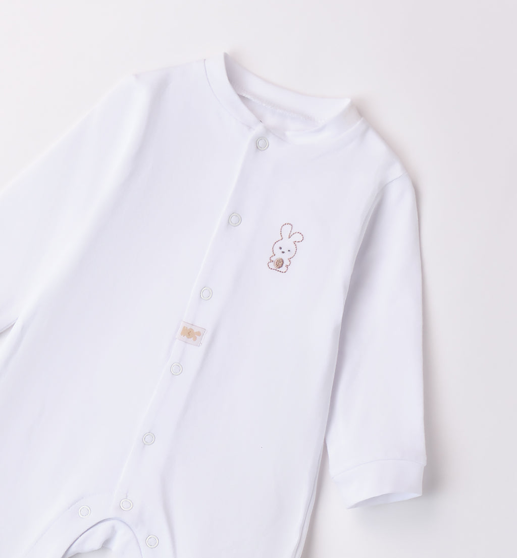  Retro della tutina unisex per neonato con piedini coperti.