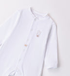  Retro della tutina unisex per neonato con piedini coperti.