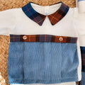  Dettaglio tutina neonato in ciniglia panna con inserto tartan e vellutino azzurro