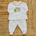 Tutina primaverile in cotone elasticizzato con colletto rosa e balza in organza multicolor per neonato
