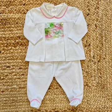Tutina primaverile in cotone elasticizzato con colletto rosa e balza in organza multicolor per neonato