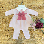 Tutina neonata in pura lana con maxi fiocco rosa e colletto ricamato

