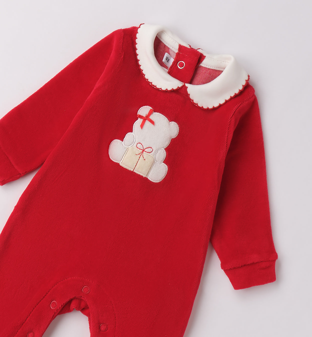 tutina in ciniglia rossa con colletto bianco per neonata