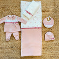 Uscita clinica neonata in ciniglia rosa con copertina sfoderabile e completo lenzuola.