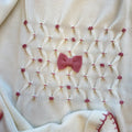 Set nascita uscita clinica neonata in lana Tollegno Merino Extrafine con ricamo nido d'ape.