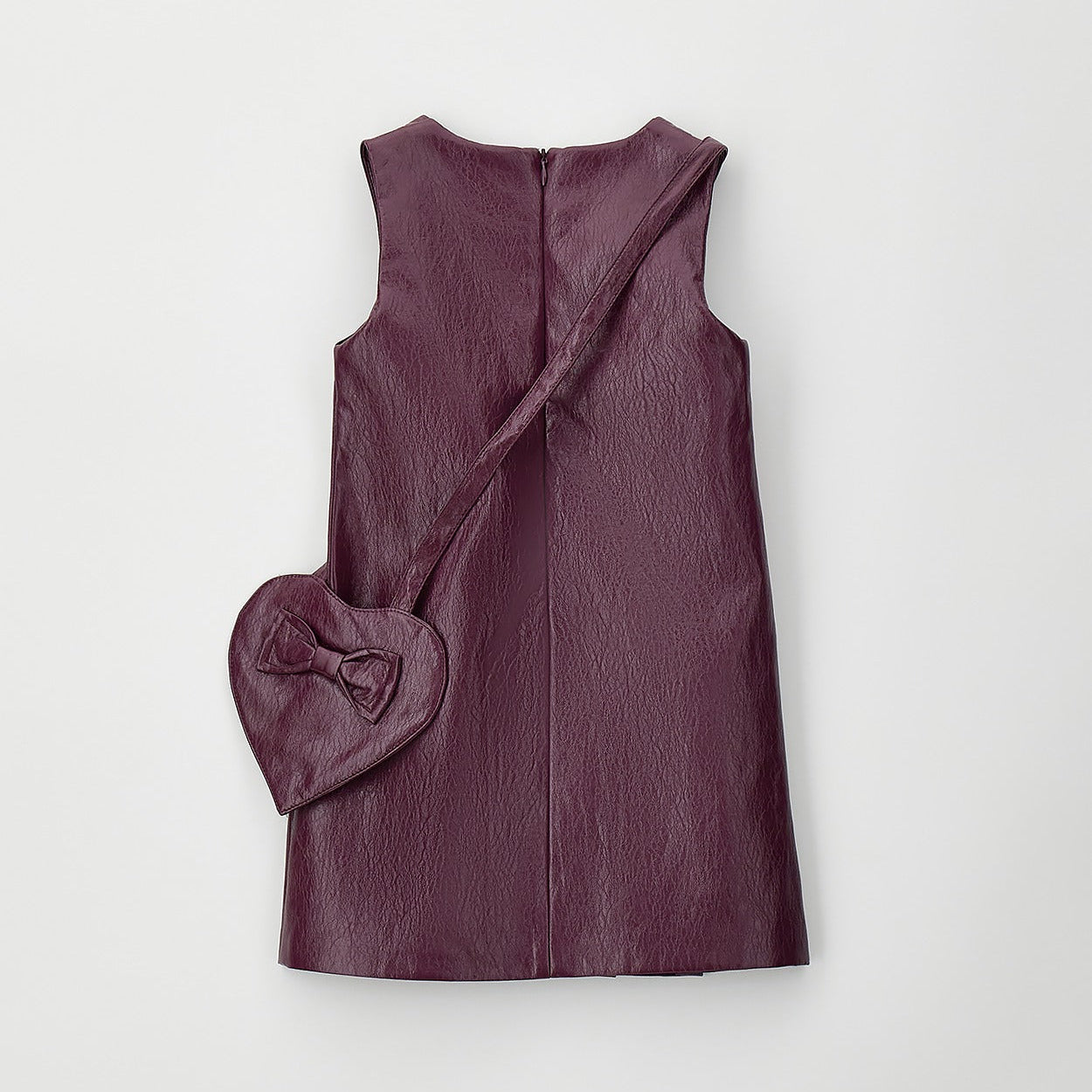 Abito bimba bordeaux effetto pelle con borsetta a cuore e fiocco