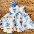Vestito bambina con fiori azzurri e grande fiore decorativo sulla spalla
