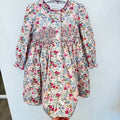 Abito bambina floreale in cotone con punto smock, colletto arricciato e dettagli bordeaux Kidivi.