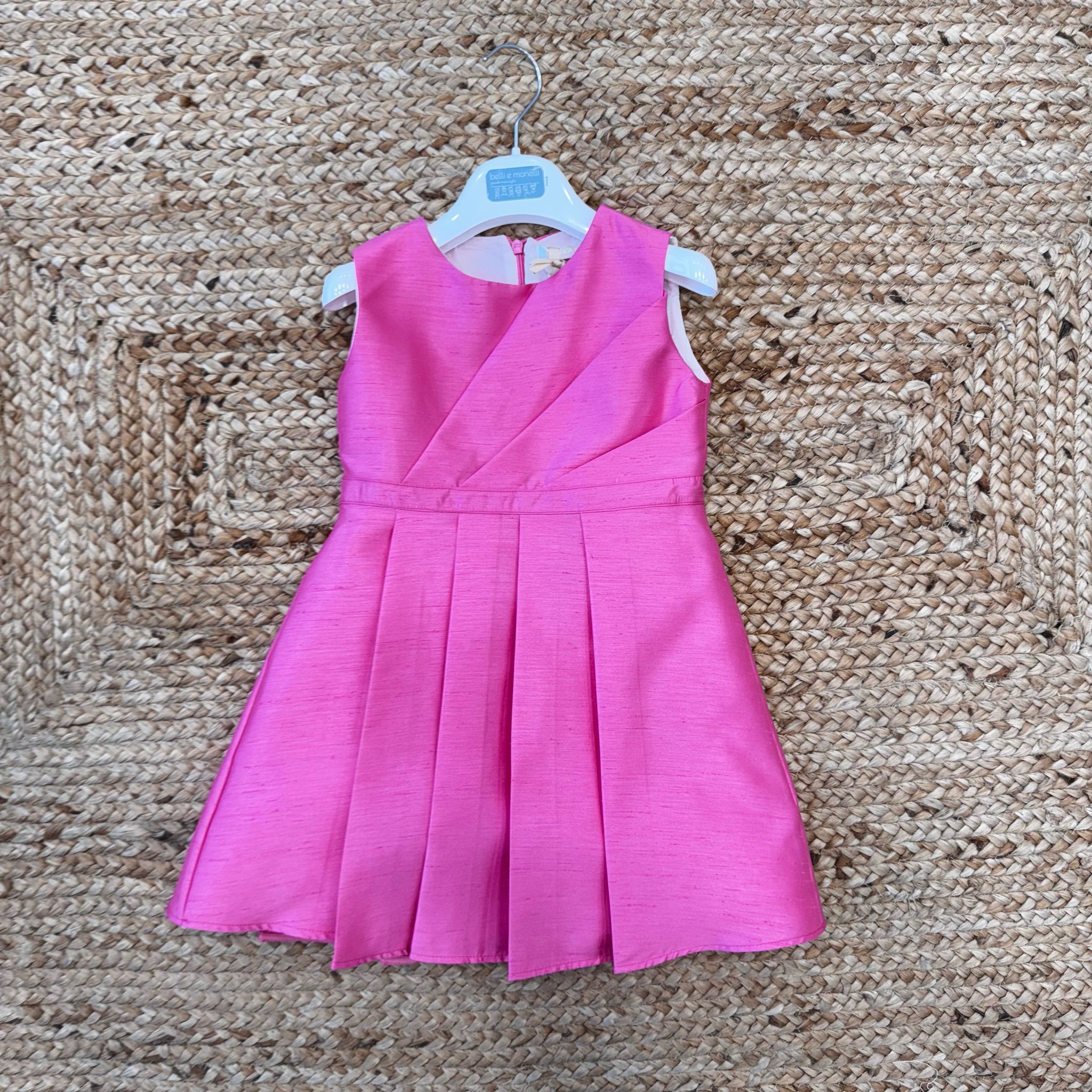 Vestito bambina fuxia elegante con pieghe e drappeggio sul corpetto