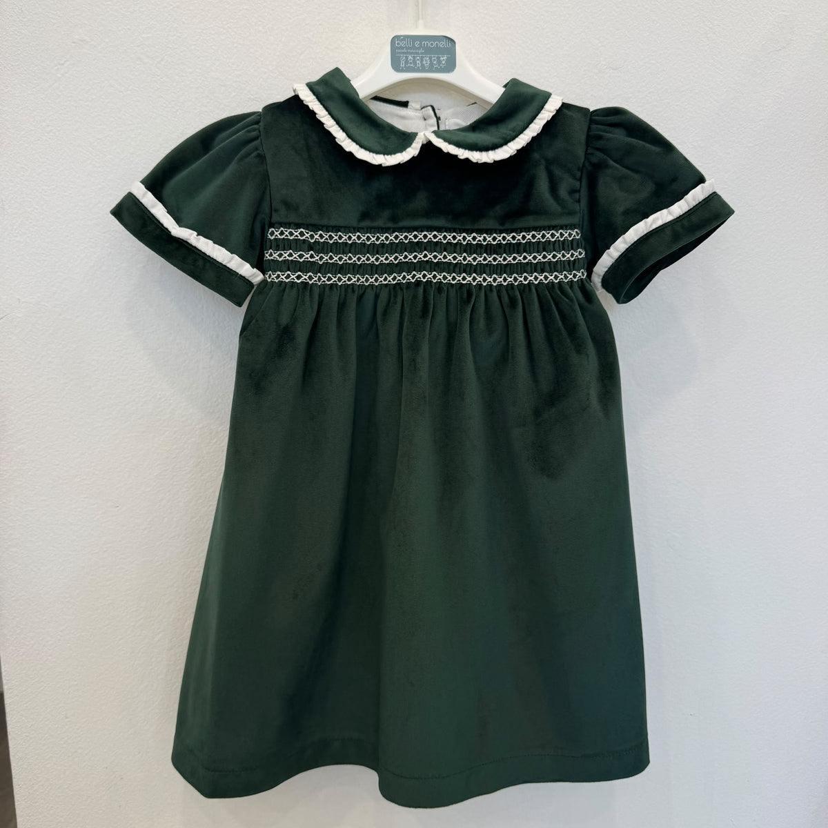 Abito bimba primo compleanno in velluto verde bottiglia con punto smock e colletto panna