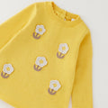 Abito bimba giallo in cotone e lana con fiori applicati in rilievo