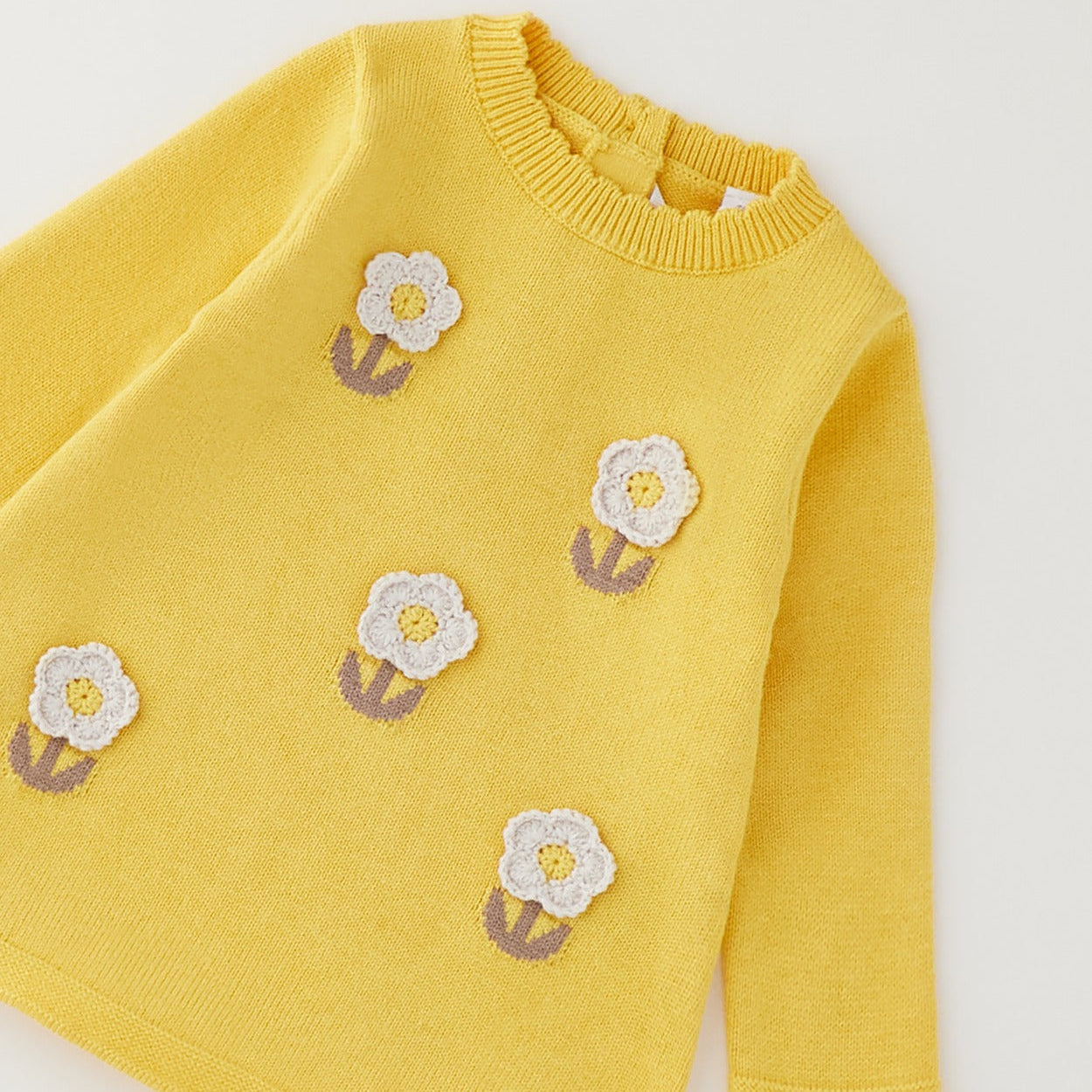Abito bimba giallo in cotone e lana con fiori applicati in rilievo