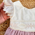 vestito neonata elegante con ricami e pizzo